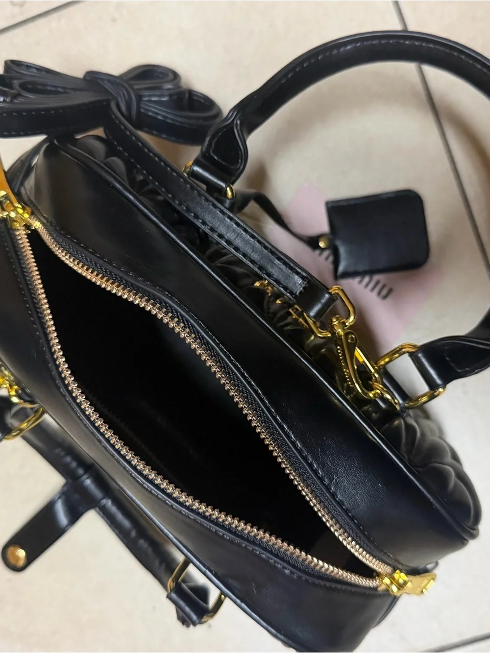 Miu Miu Black Quilted Leather Satchel with Gold Hardware